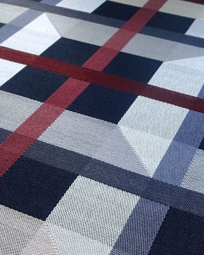 jacquard weefsel van Theo Rooden in grijs, blauw en rood